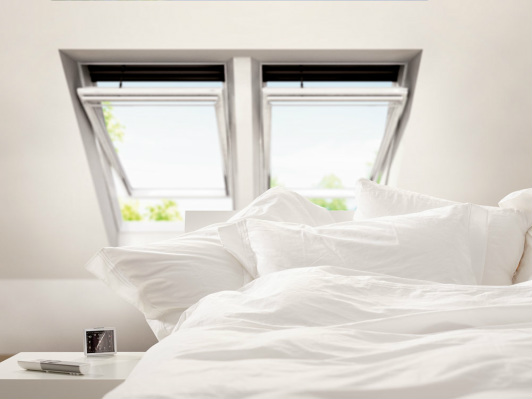 afb. 06.5.7 - 1 Twee dakramen naast elkaar, met koppelstuk. Bron: VELUX